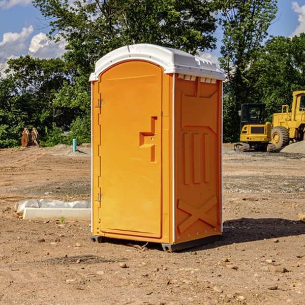 how often are the portable restrooms cleaned and serviced during a rental period in McSwain